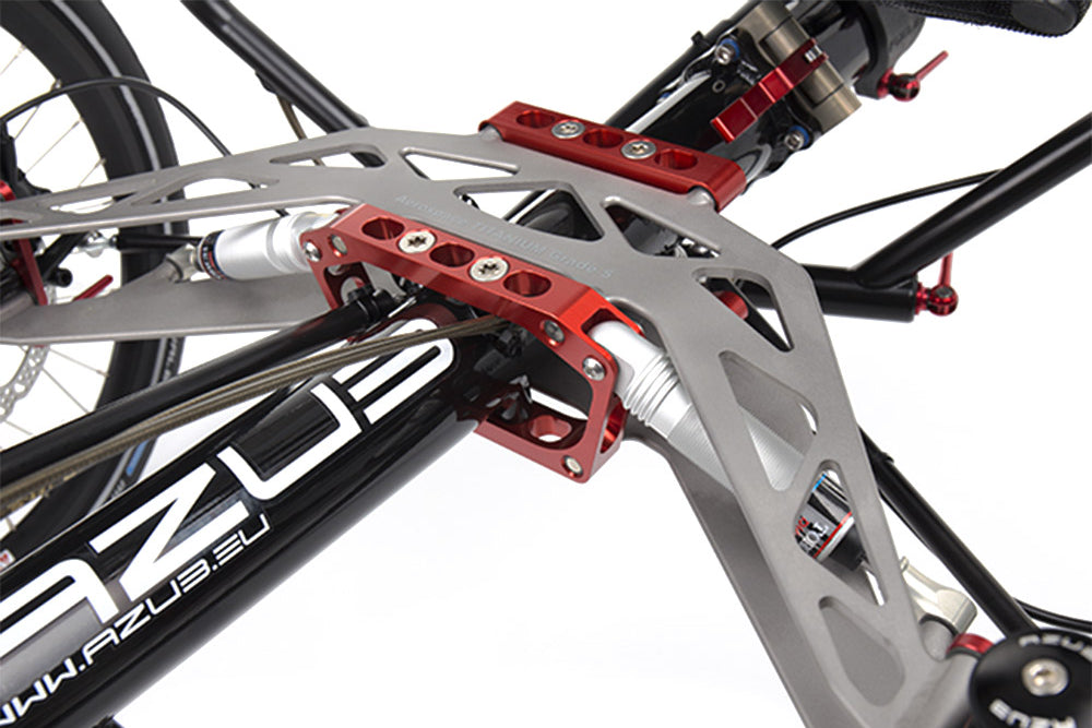 Close-up of the AZUB Ti-FLY 26 titanium front suspension and tunable rear shock