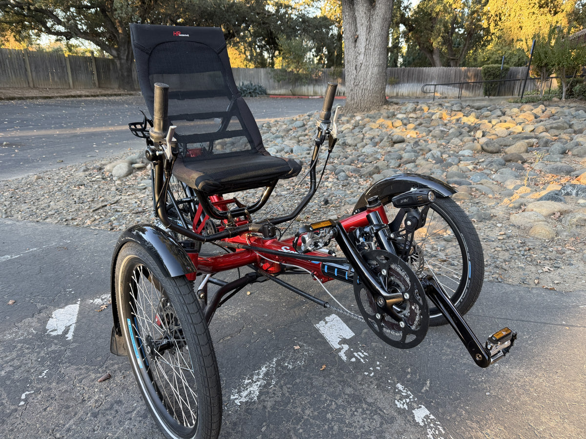 Used HP Velotechnik Scorpion high-seat trike, red, front three-quarter view