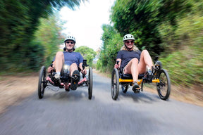 Two riders on ICE Adventure and Sprint X Tour PERS chainless trikes
