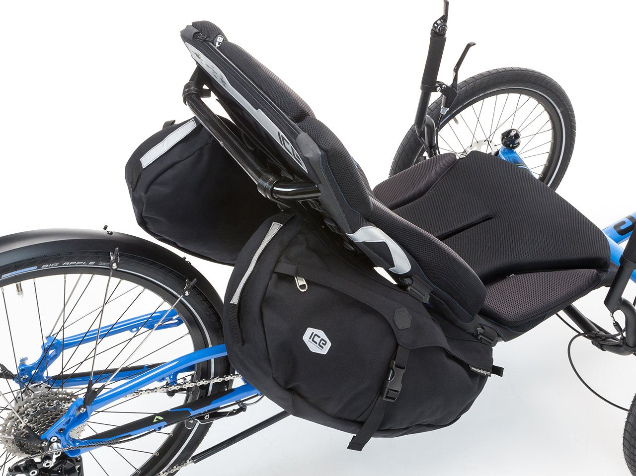 ICE Sidepods pair, black, mounted on both sides of an ICE Ergo-Luxe seat on a blue ICE trike