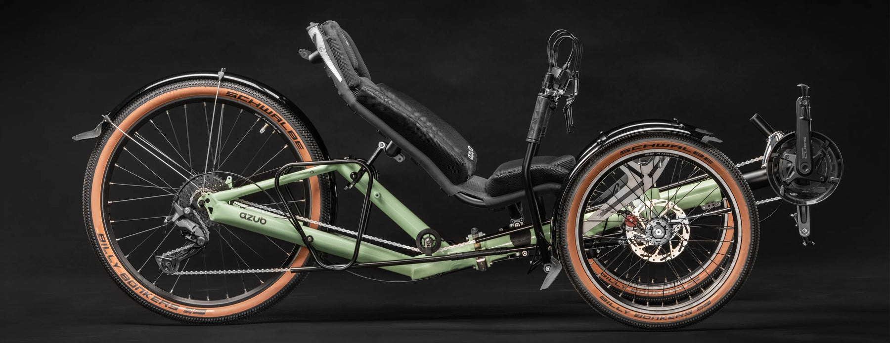 AZUB T-Tris 26 recumbent trike in pastel green on a black background