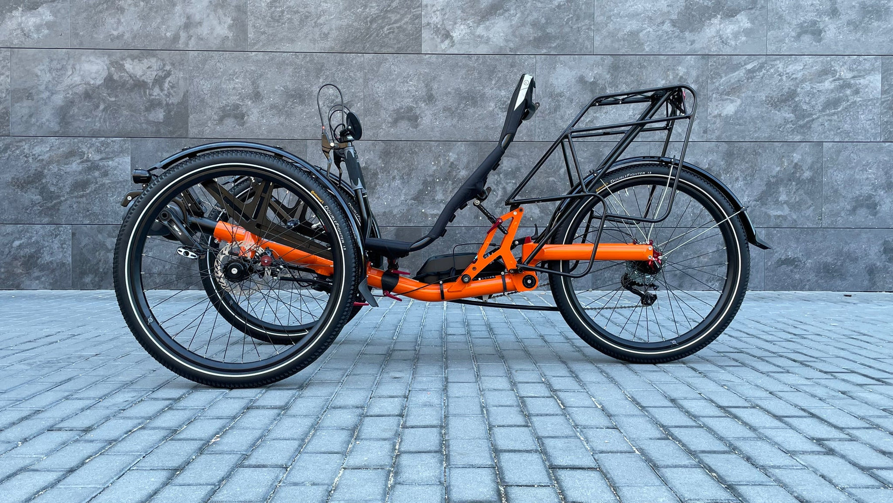 AZUB TRIcon GR recumbent trike orange three-quarter side view