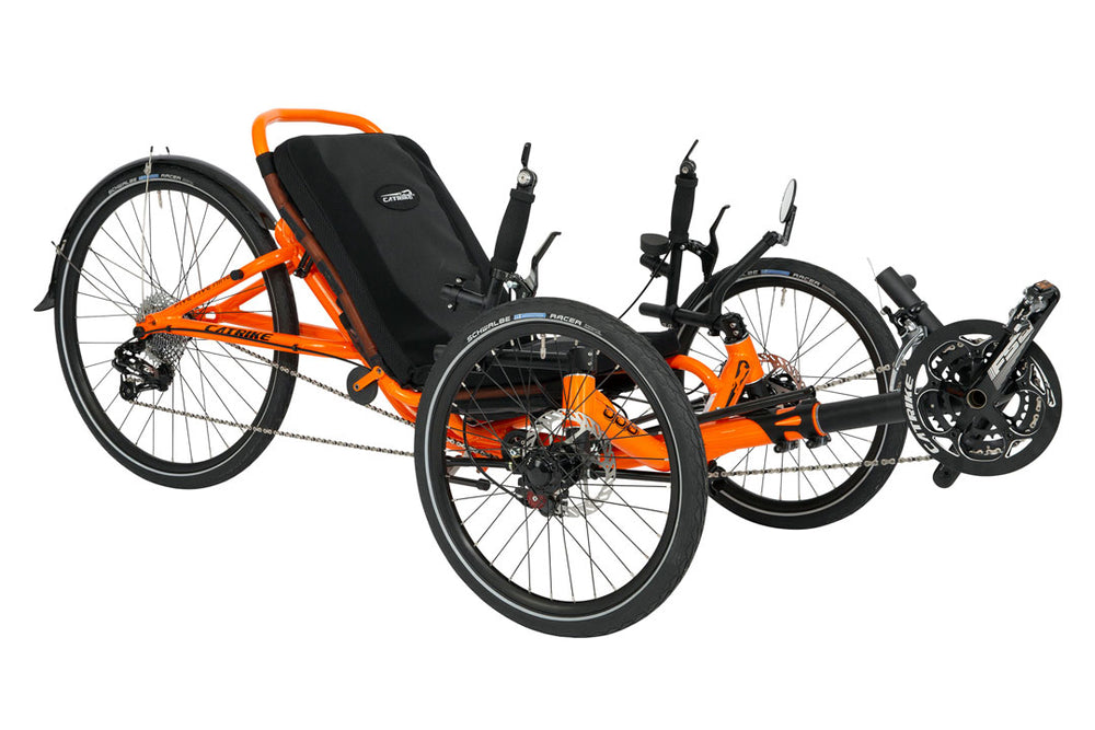Catrike 5.5.9 recumbent trike in orange, three-quarter view