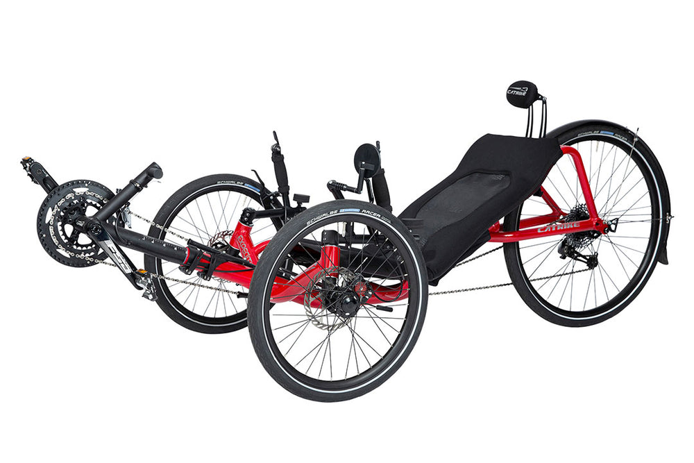 Catrike Expedition recumbent trike in red, three-quarter view