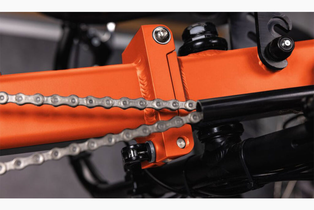 GreenSpeed Magnum BW folding hinge clamp detail, orange frame folds without tools