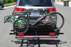 Easy Load Tray loaded with a recumbent trike on the back of a vehicle
