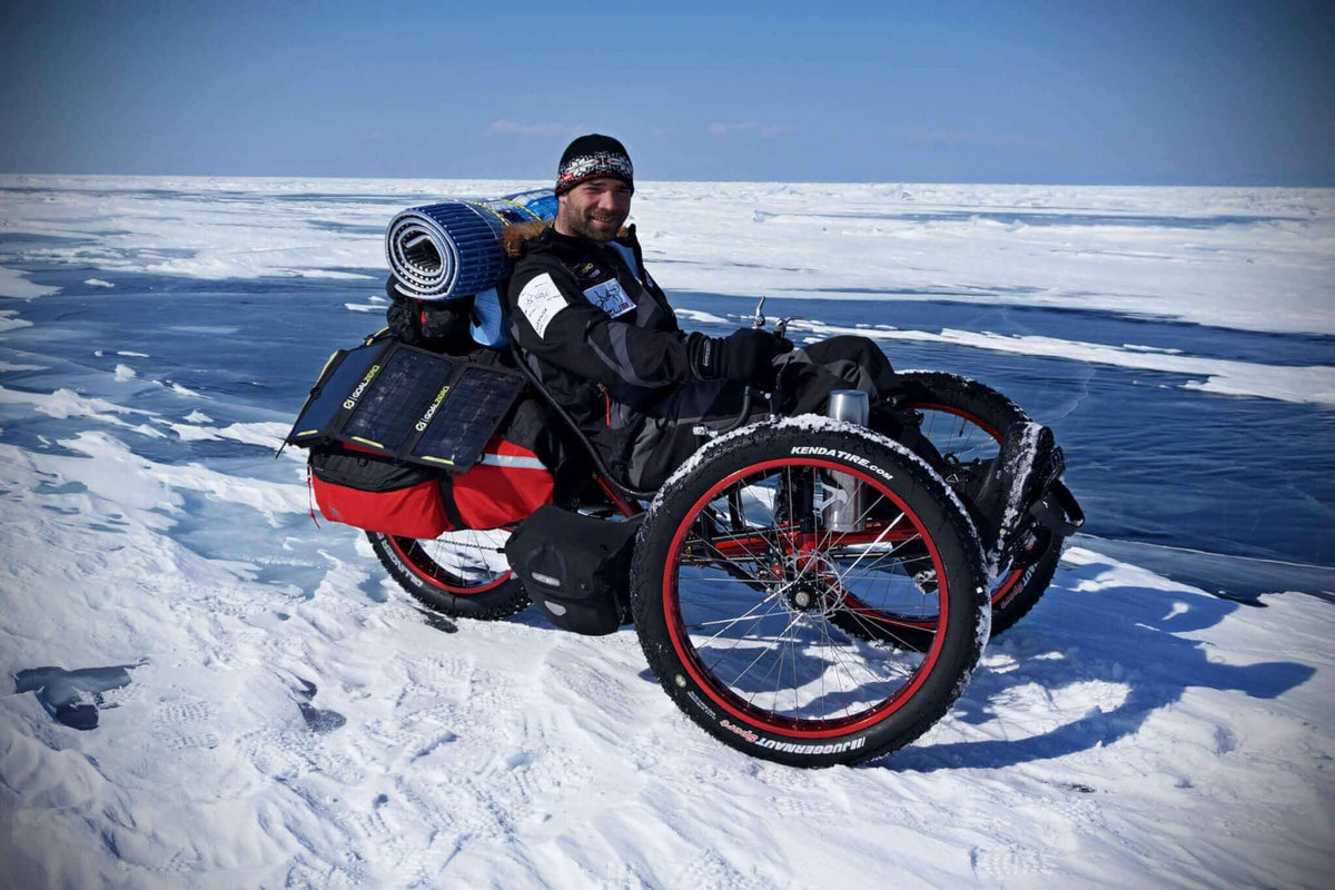 Rider on an AZUB FAT recumbent fat-tire trike crossing frozen Lake Baikal
