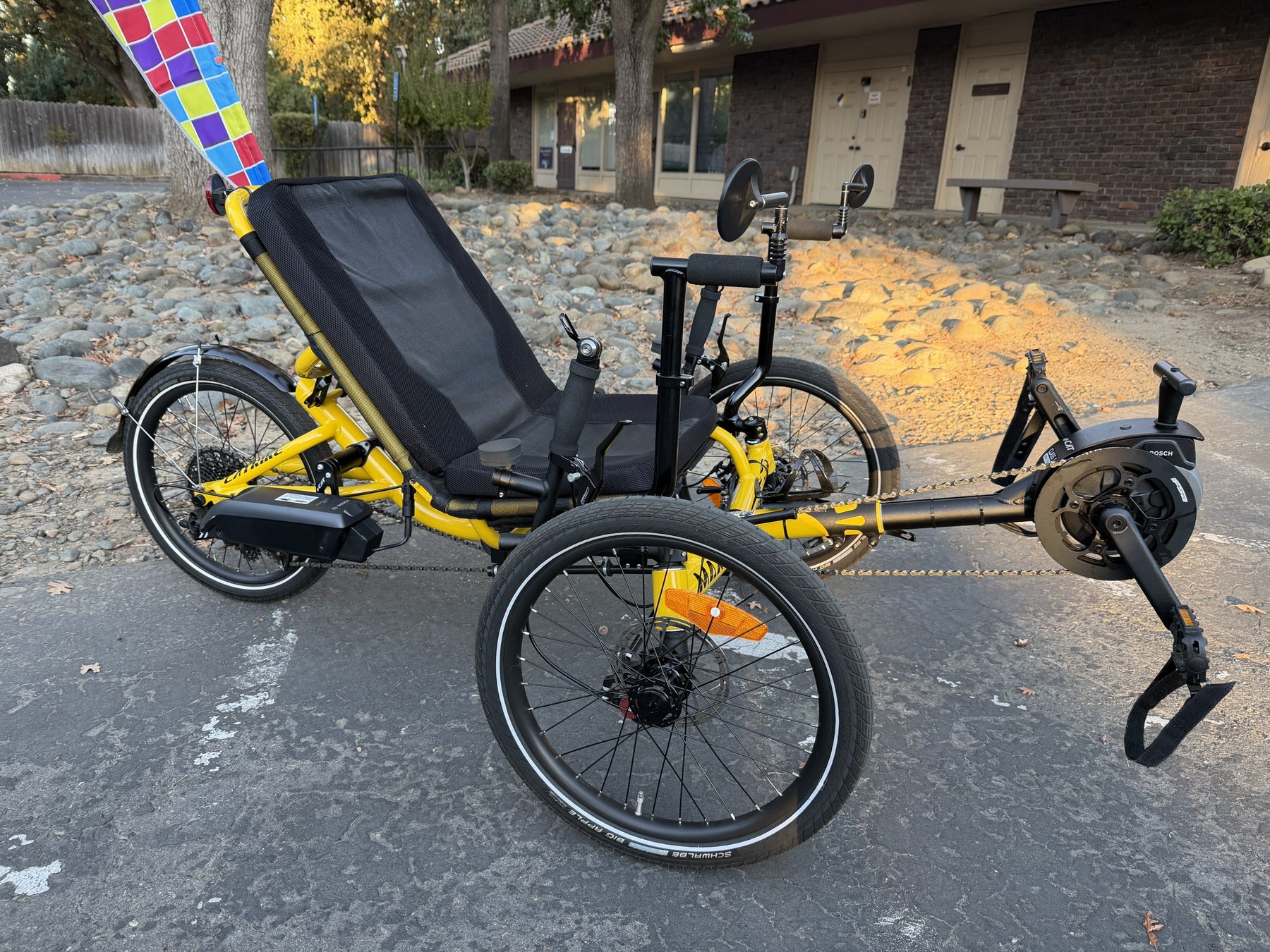 Demo Catrike MAX eCAT in Firefly Yellow, side view with Bosch motor and battery
