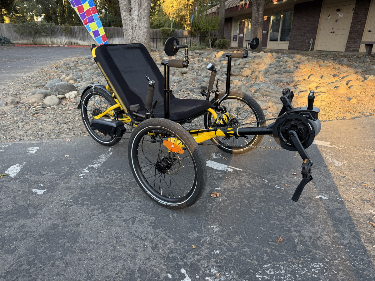 Demo Catrike MAX eCAT in Firefly Yellow, three-quarter view