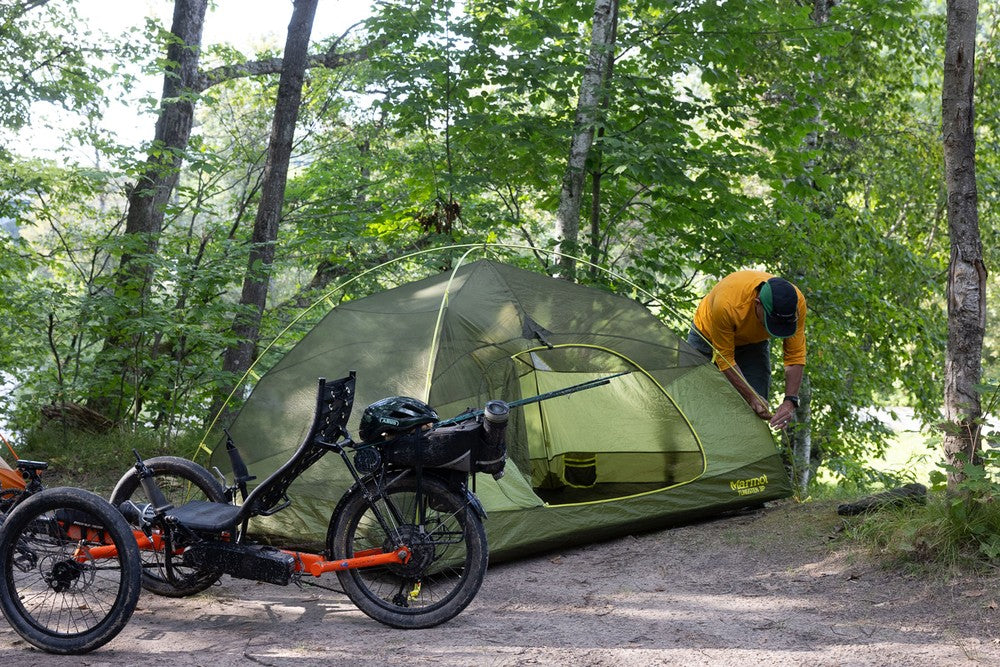 GreenSpeed GT20 RS recumbent trike loaded for bikepacking at a campsite