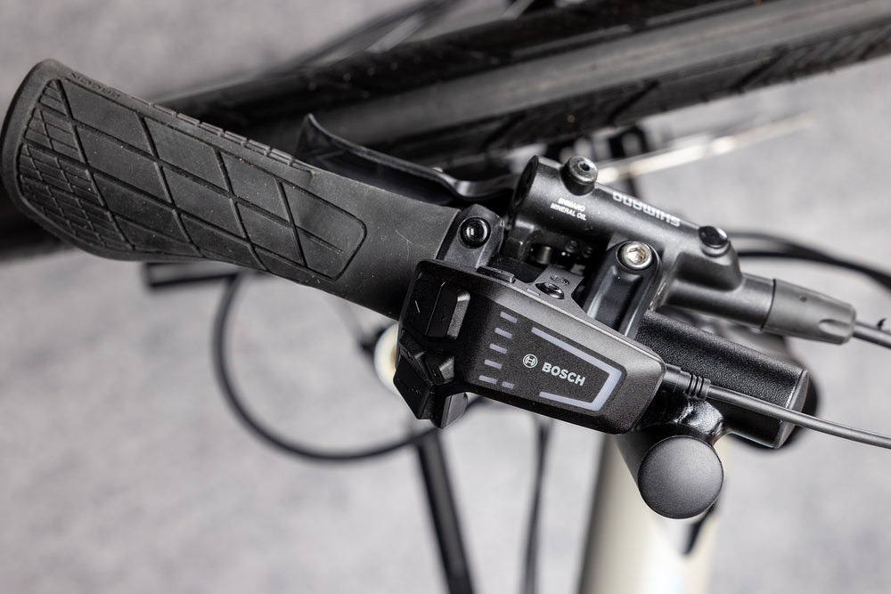 Bosch Smart LED Remote and hydraulic brake lever on the TerraTrike GTS e+ handlebar