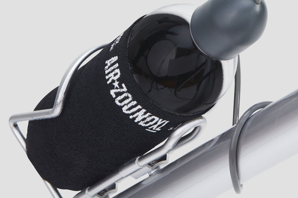 AirZound air reservoir bottle seated in a frame bottle cage, the part you refill with a bike pump
