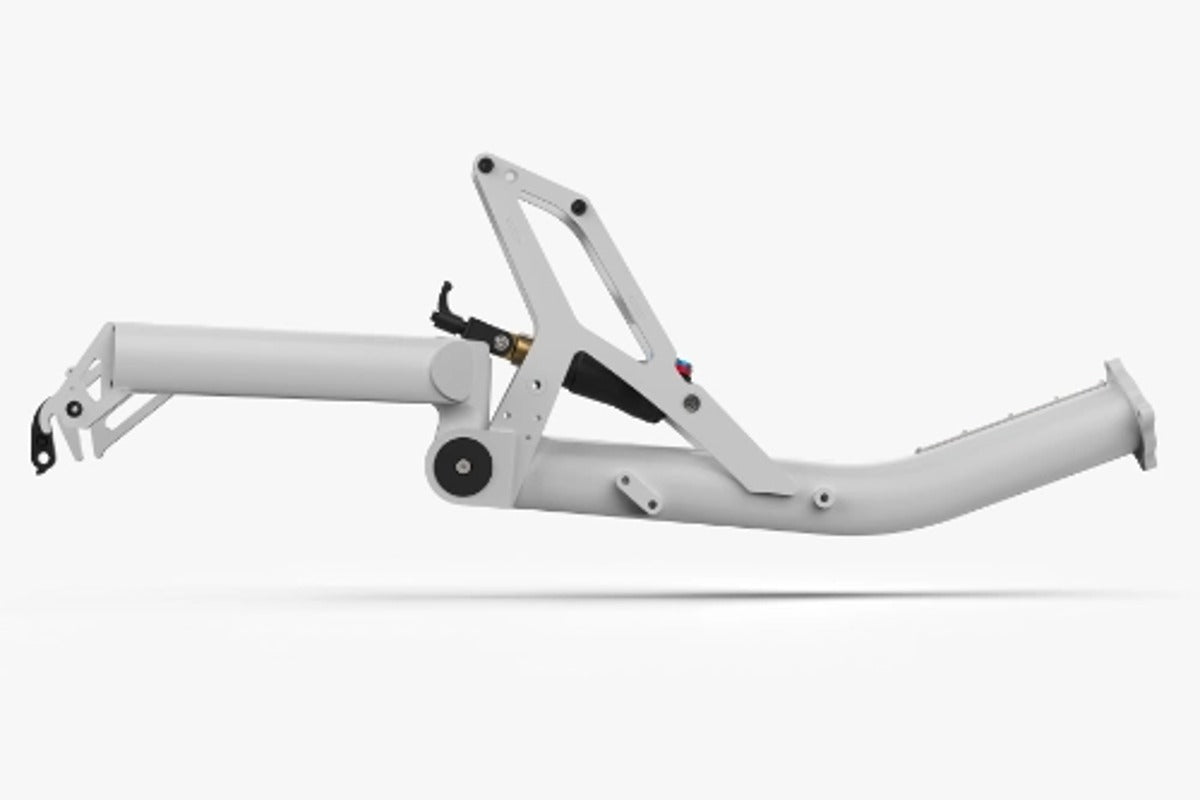 Rear frame of the AZUB Ti-FLY X showing the mountain-bike air shock that gives the trike full rear suspension