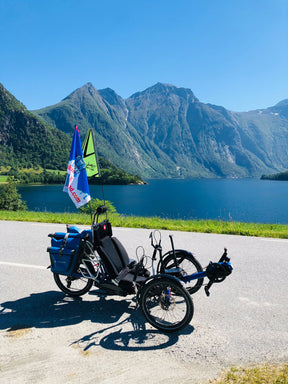 AZUB Ti-FLY 20 recumbent trike parked beside a Norwegian fjord