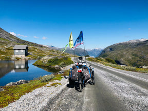 AZUB Ti-FLY 20 loaded for touring on a mountain gravel road