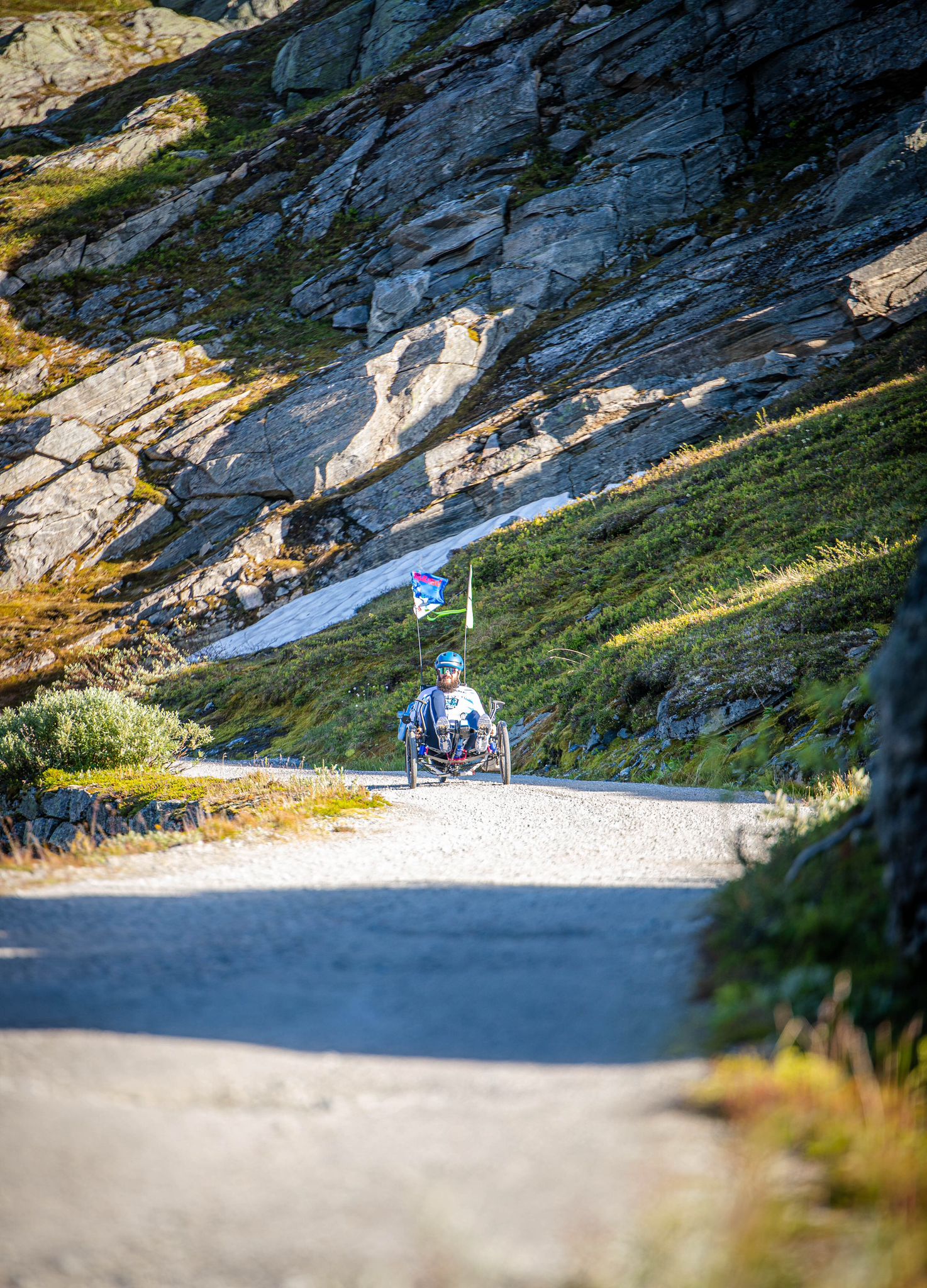 AZUB Ti-FLY 20 recumbent trike ridden on a mountain gravel path